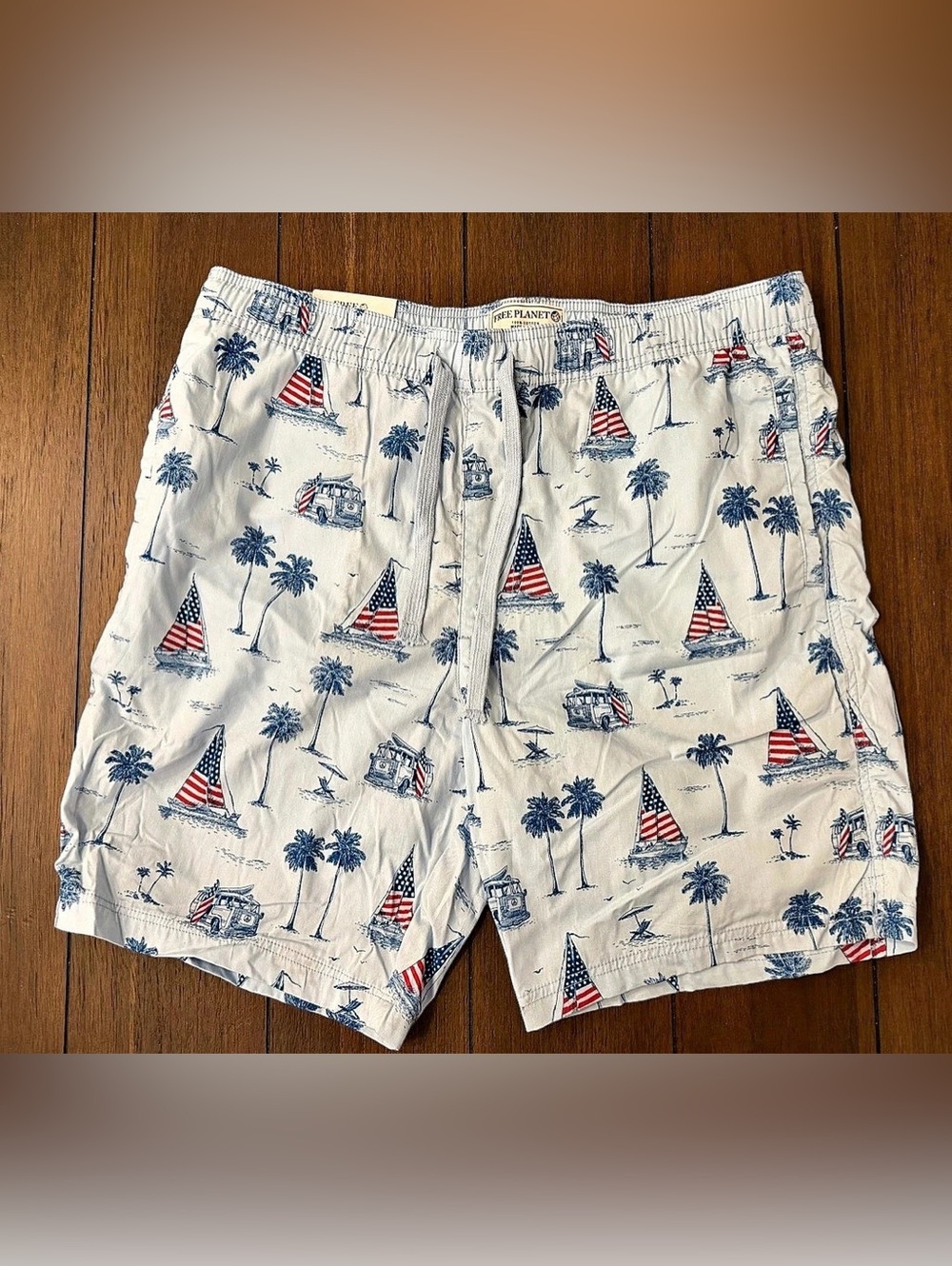Free Planet Swim Trunks